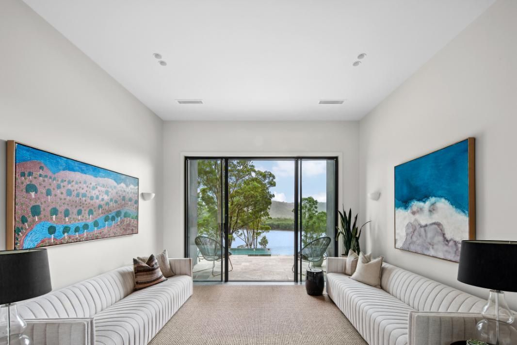 Living Room With A Lot Of Furniture and A Sliding Glass Door Leading To A Pool  — That Painter Guy In South Nowra, NSW