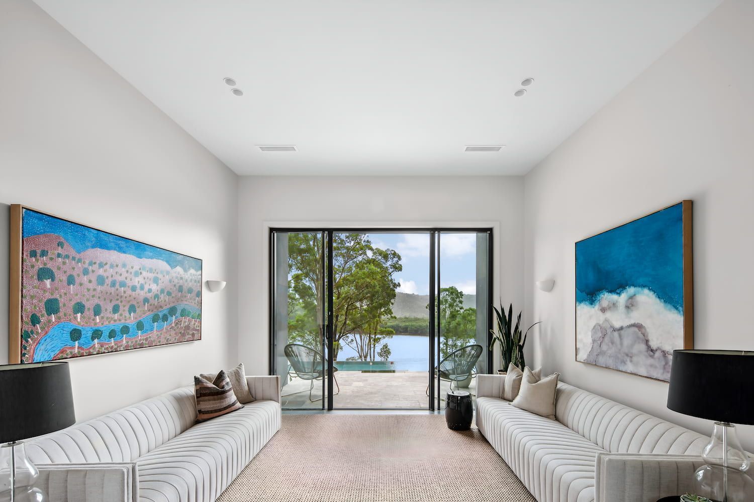 A Living Room With A Lot Of Furniture And Paintings On The Wall — That Painter Guy In Kangaroo Valley, NSW