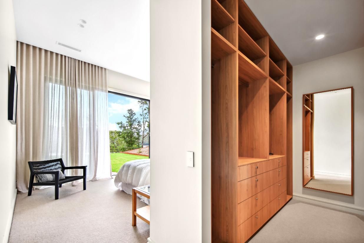 Bedroom With A Large Walk In Closet and A Large Mirror  — That Painter Guy In South Nowra, NSW