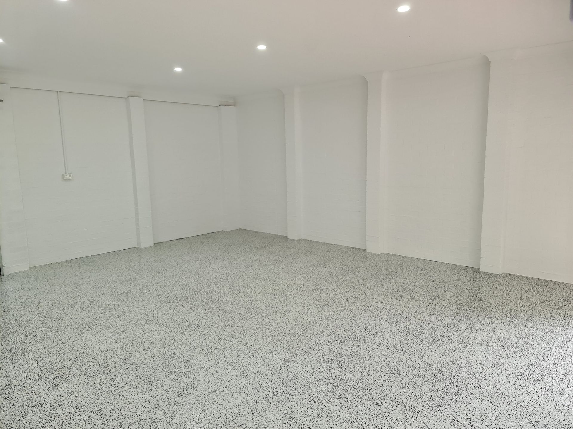 An Empty Room With White Walls And A Gray Floor — That Painter Guy In South Nowra, NSW