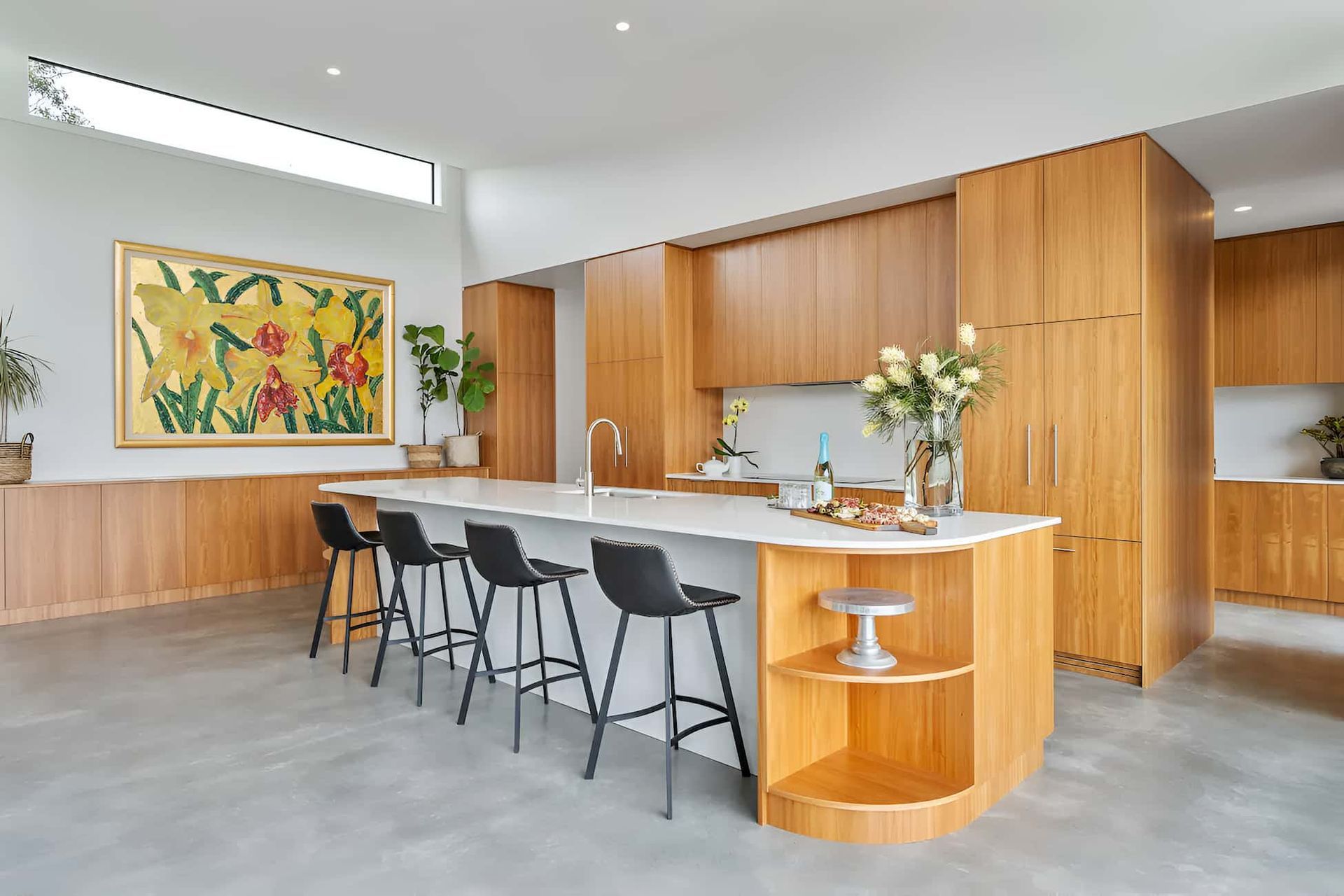 A Kitchen With A Large Island And Stools And A Picture On The Wall — That Painter Guy In South Nowra, NSW