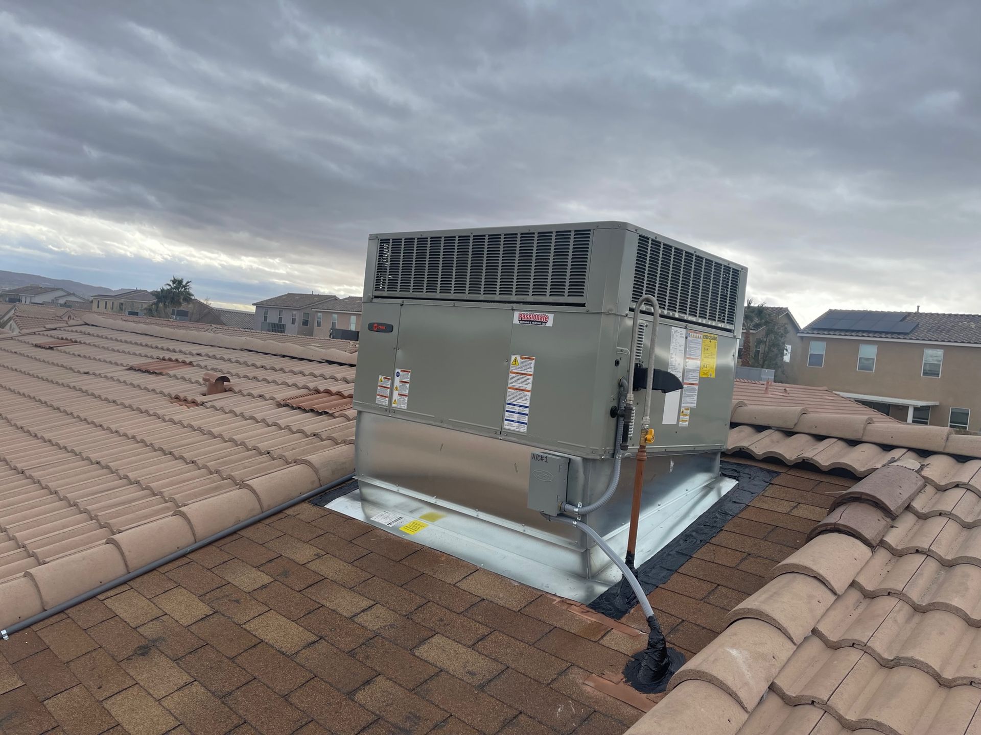Air conditioner installing — Las Vegas, NV — Passionate Cooling & Heating LLC