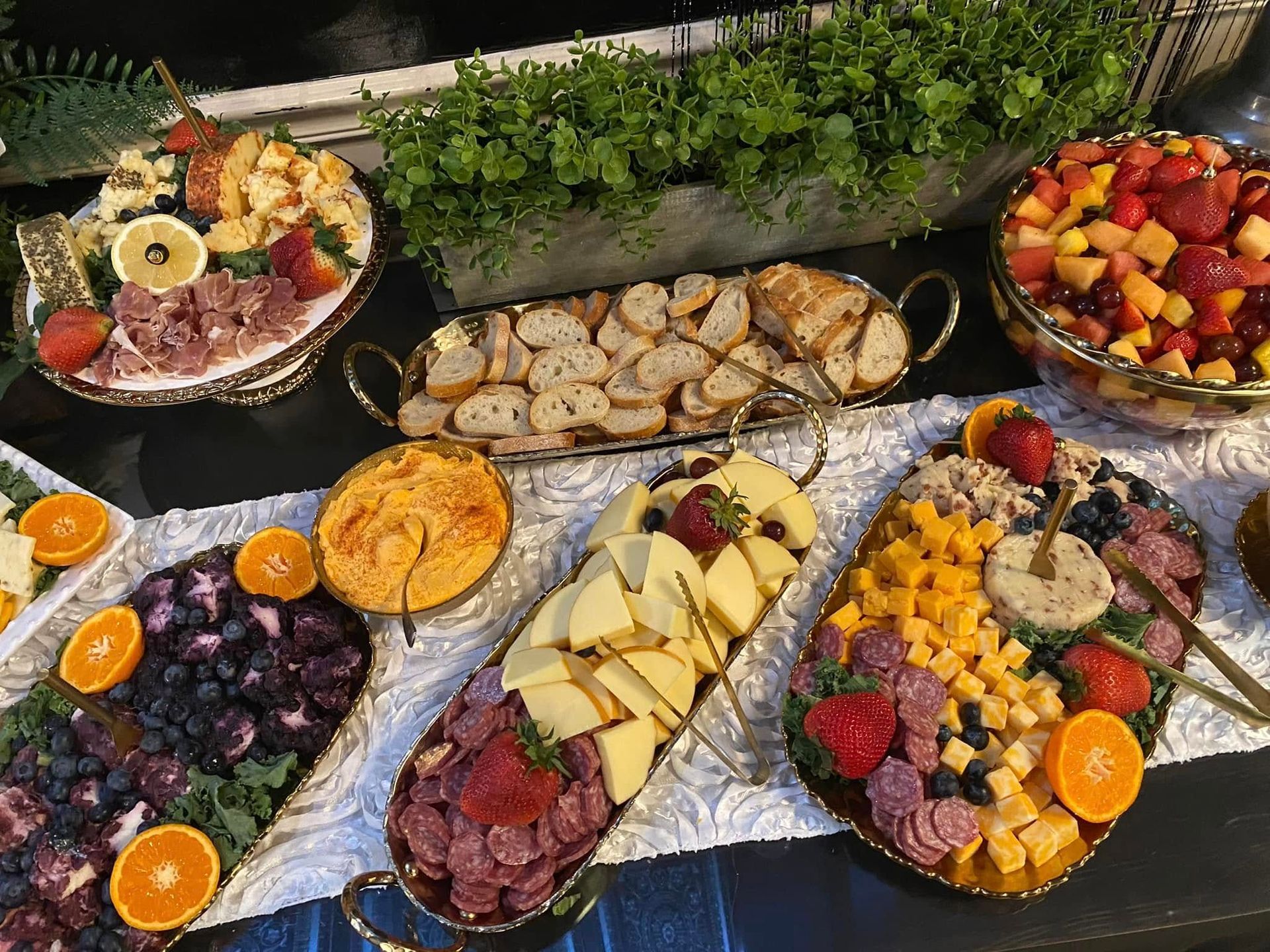 assorted charcuterie boards and fruit trays