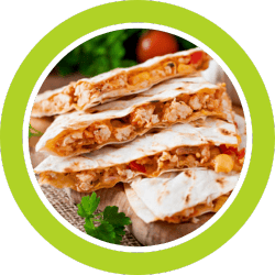 Chicken quesadillas, stacked, with melted cheese and red peppers, in a green circle.