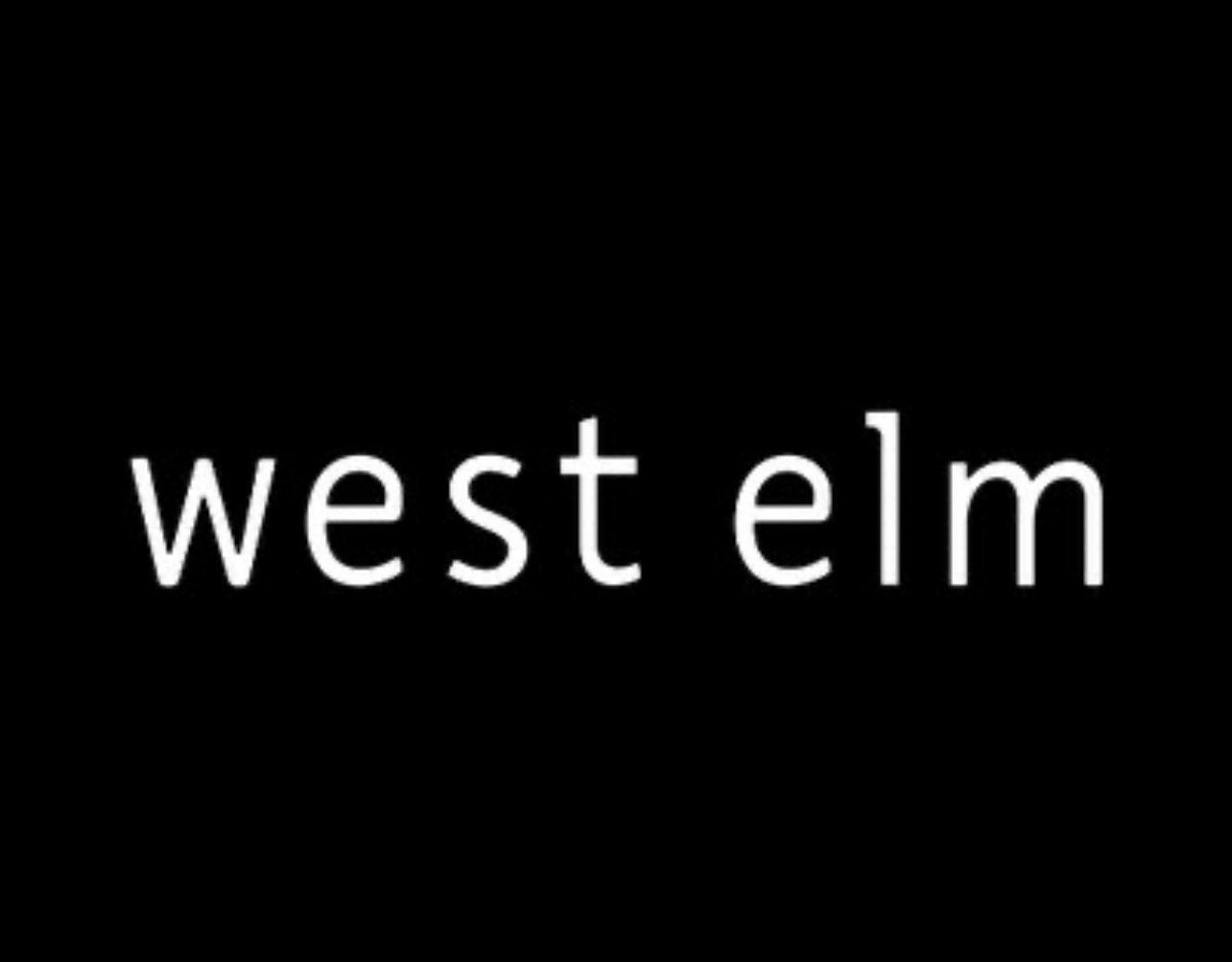 A black background with white text that says west elm