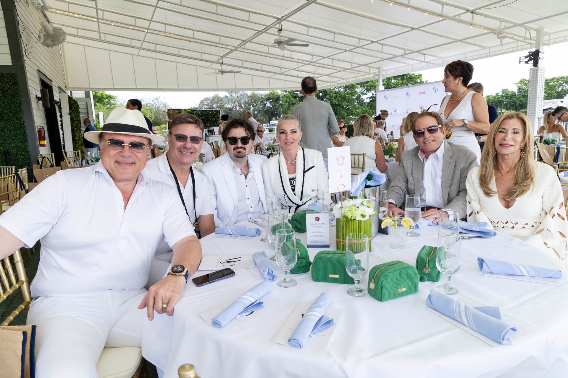 A group of people are sitting at a table.