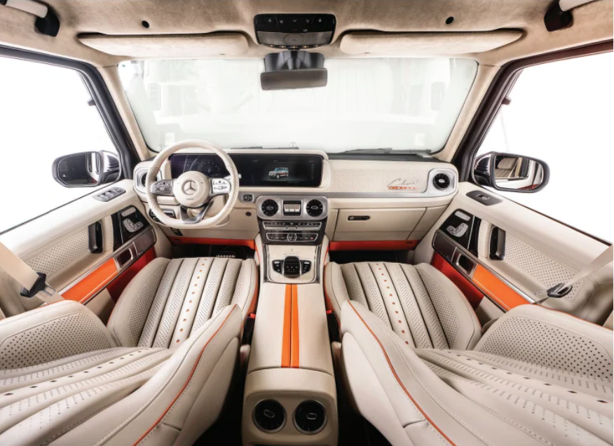The interior of a car with a steering wheel and seats