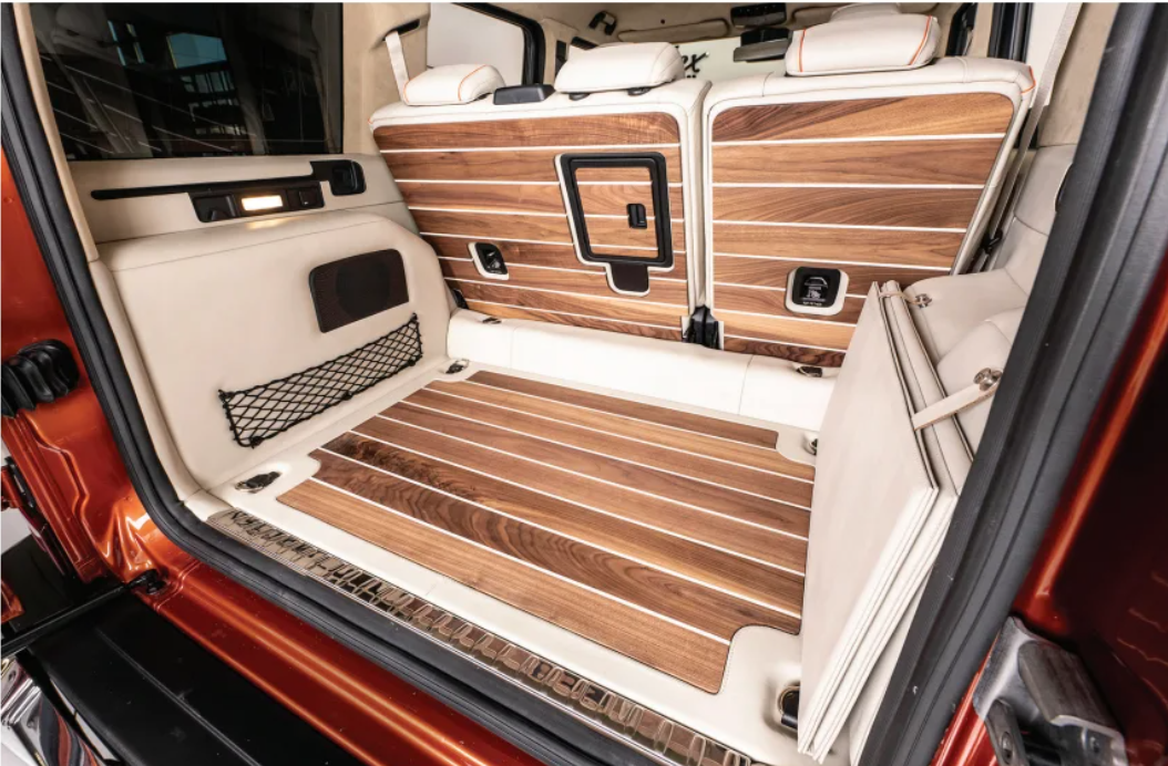 The trunk of a car with a wooden floor