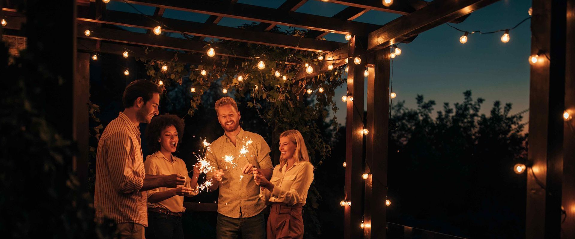 Landscape Lighting With String Lights On Pergola