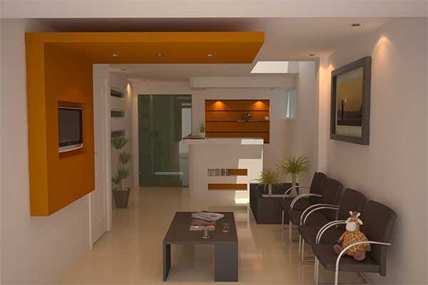 Una sala de espera con sillas, una mesa y un televisor