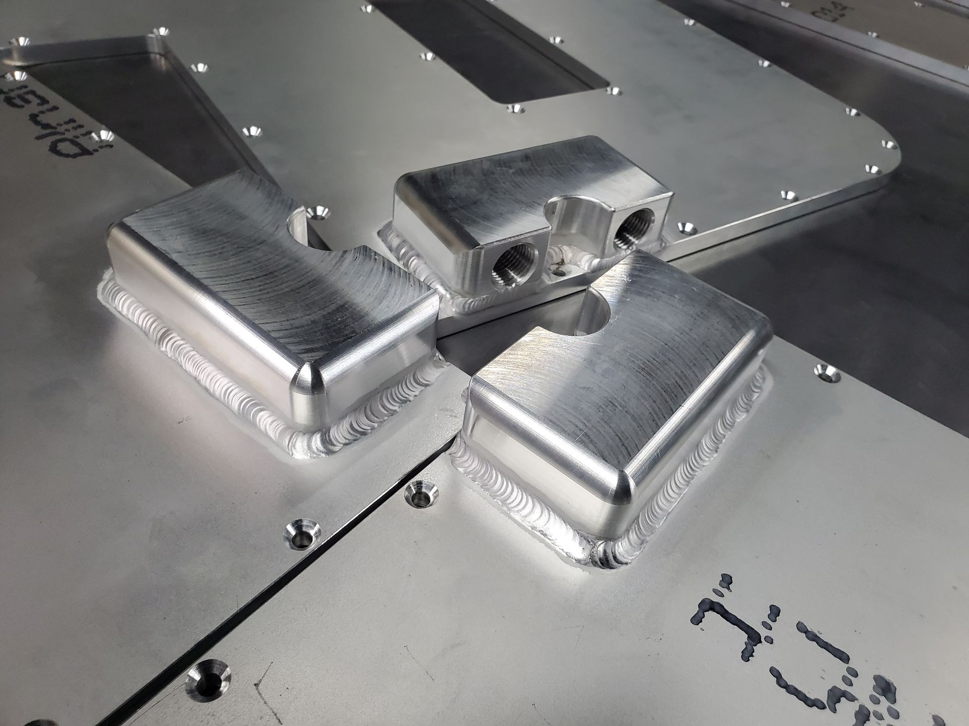 A close up of a piece of metal with the letter u on it