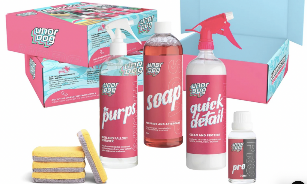 A box of soap , soap , quick detail , and sponges.