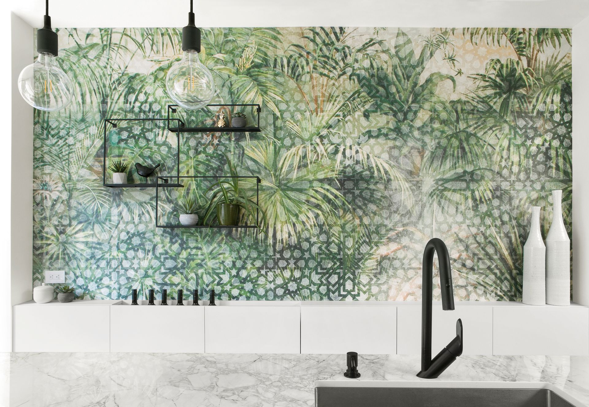 A kitchen with a sink , shelves , and a mural on the wall.