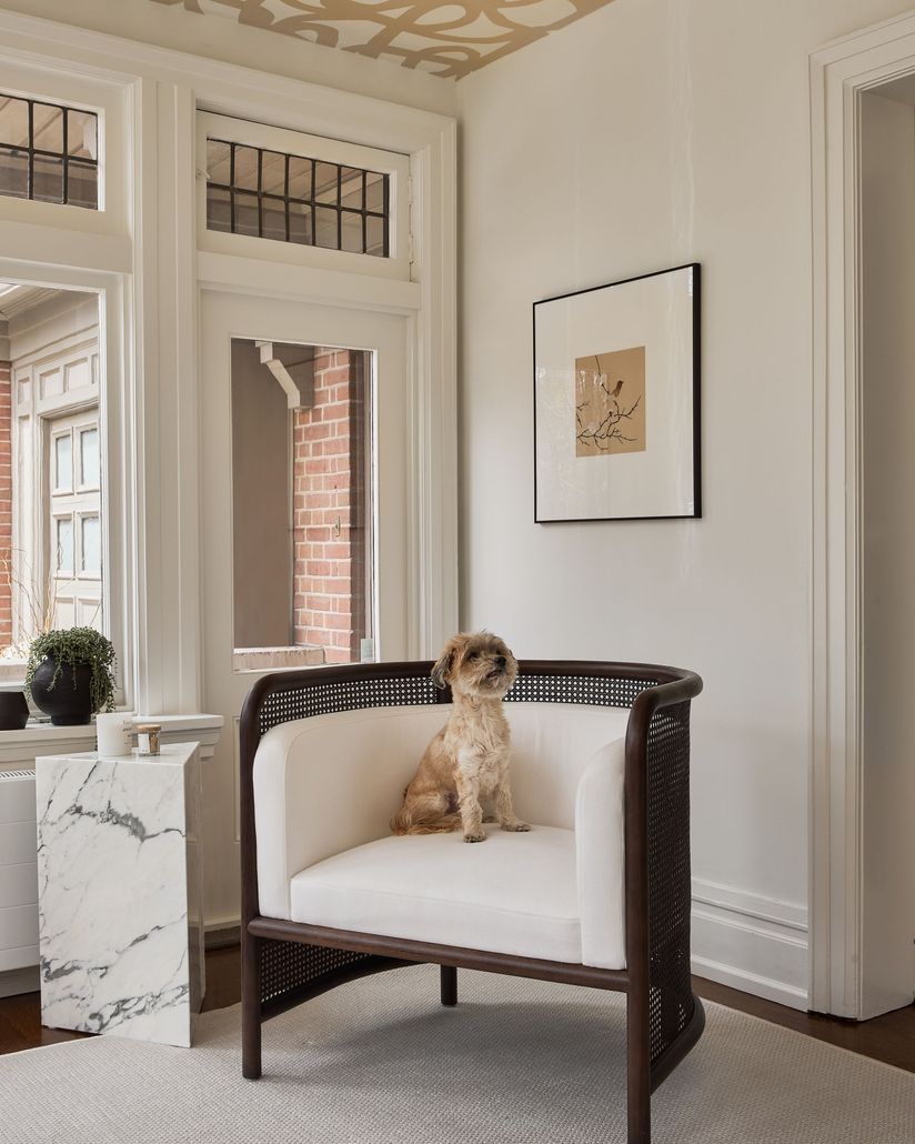 A fireplace with a framed picture on top of it