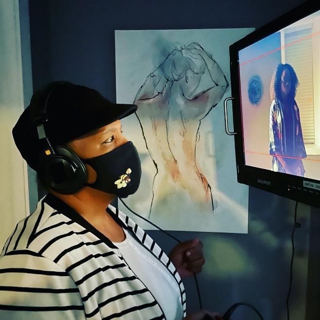  Director Jillian Bullock checking a scene