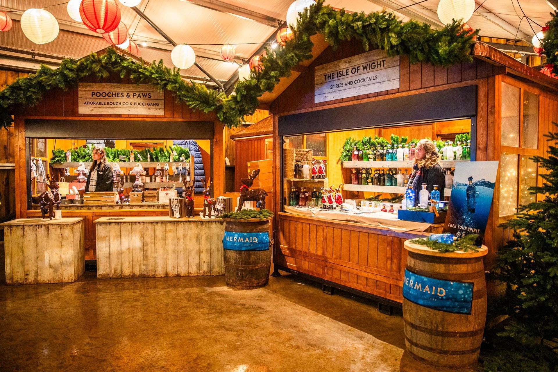 A wooden building with barrels