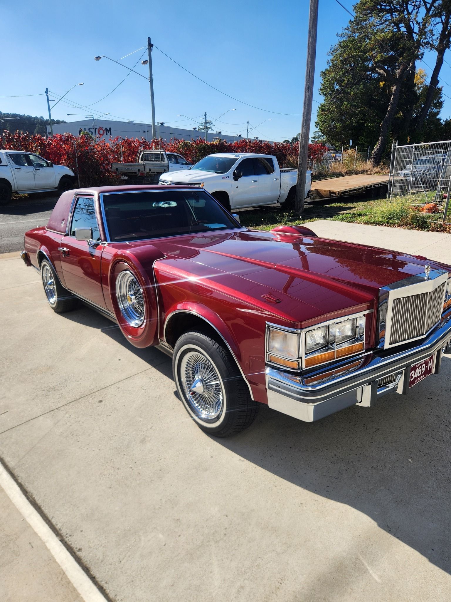 Burgundy-coloured classic car with chrome details parked outside. — COOTA Automotive Services in Ballarat East, VIC