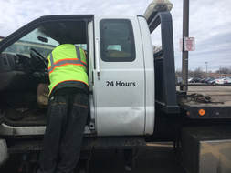 tow truck driver picture In Minneapolis, mn., MN