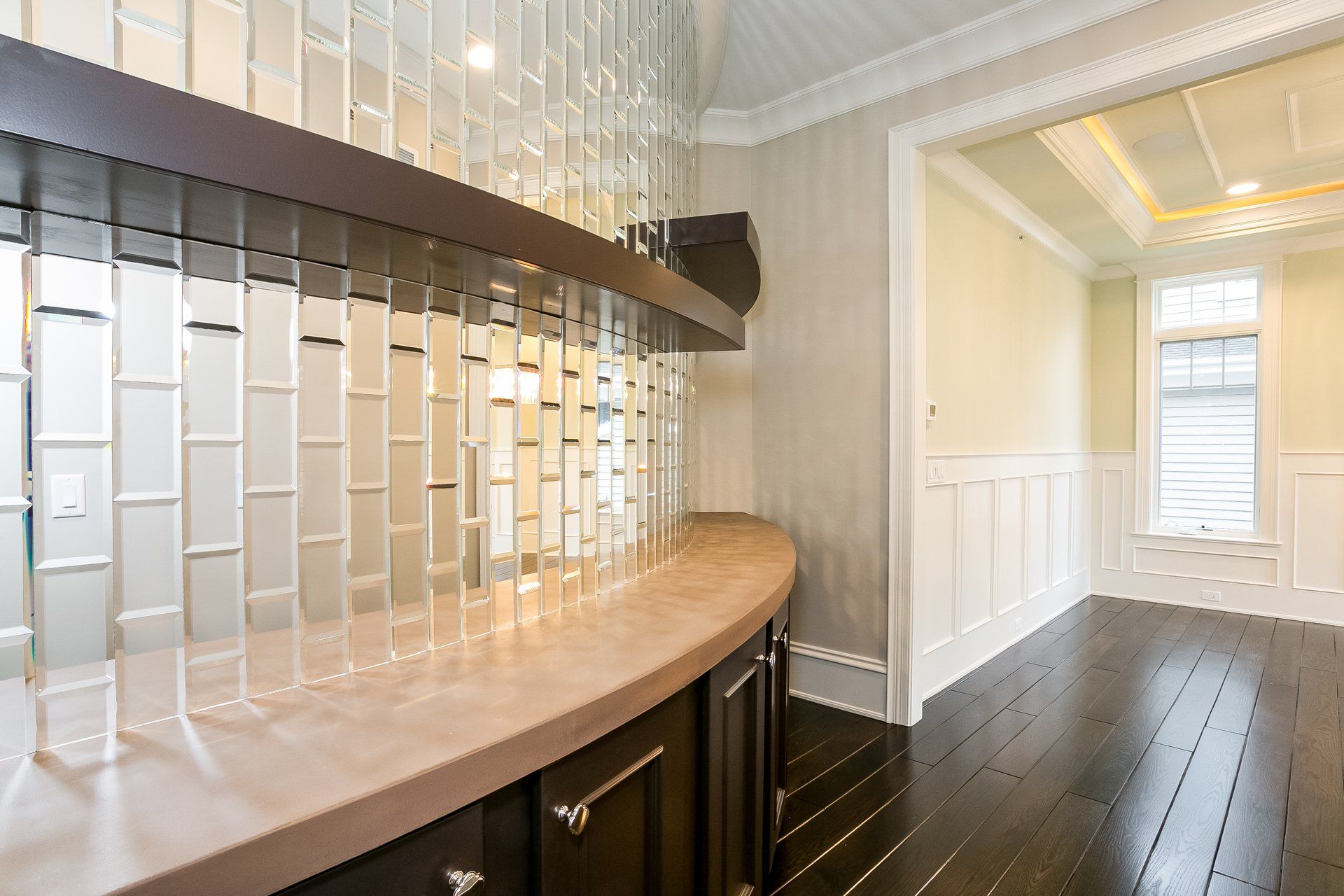 There is a bar in the middle of the room.