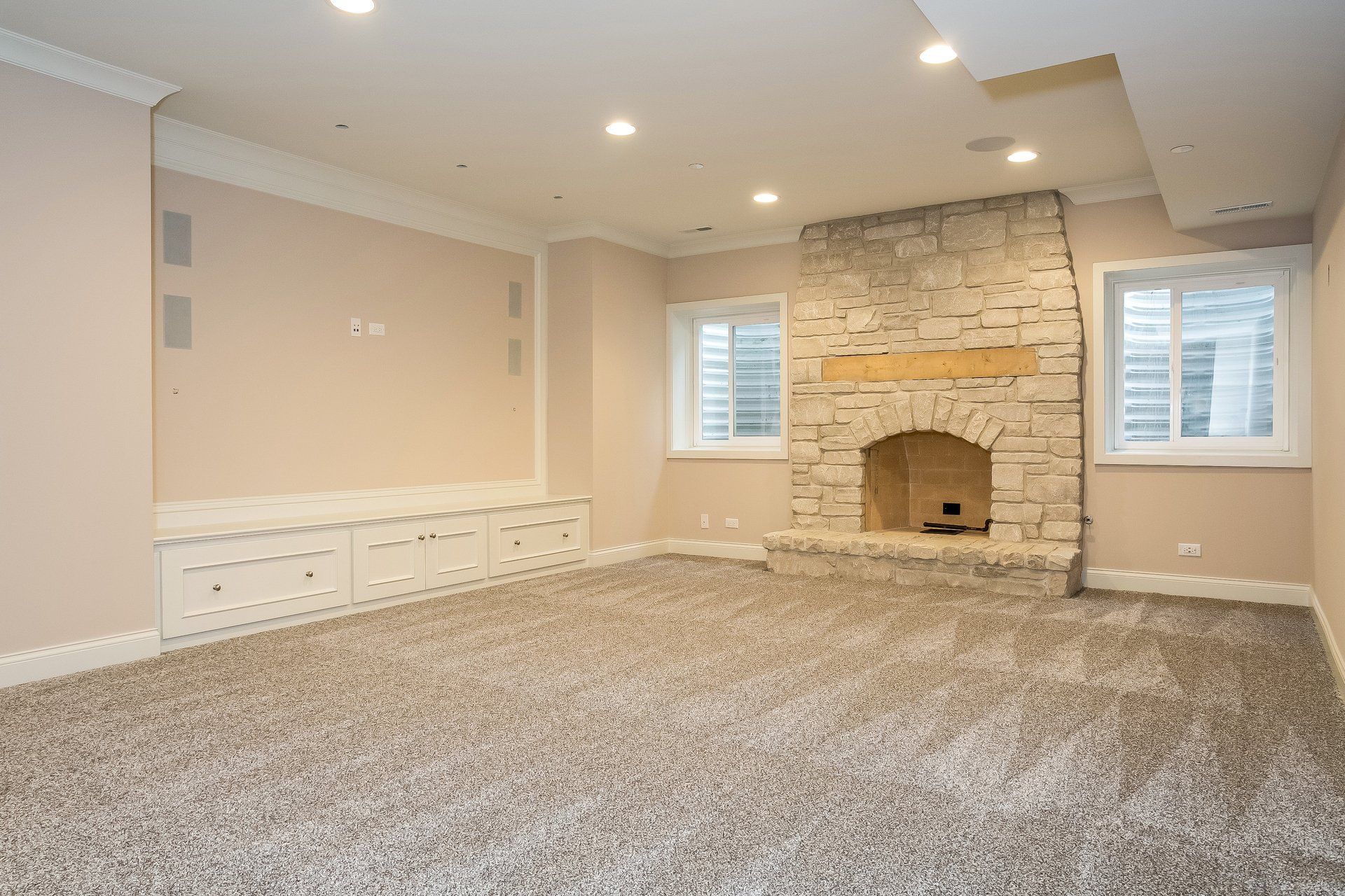 There is a fireplace in the middle of the room.