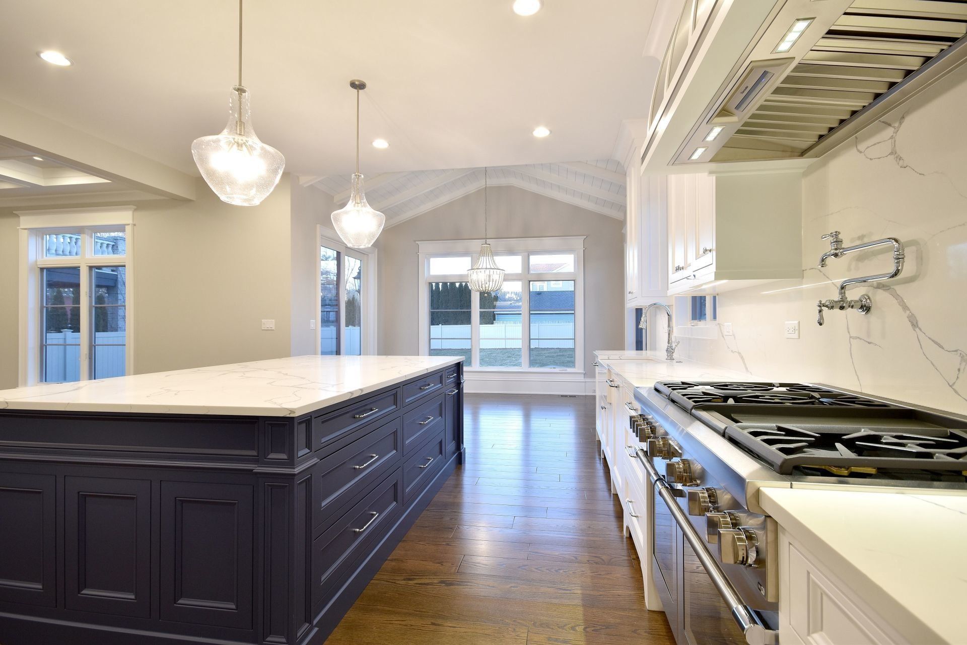There is a large island in the middle of the kitchen.