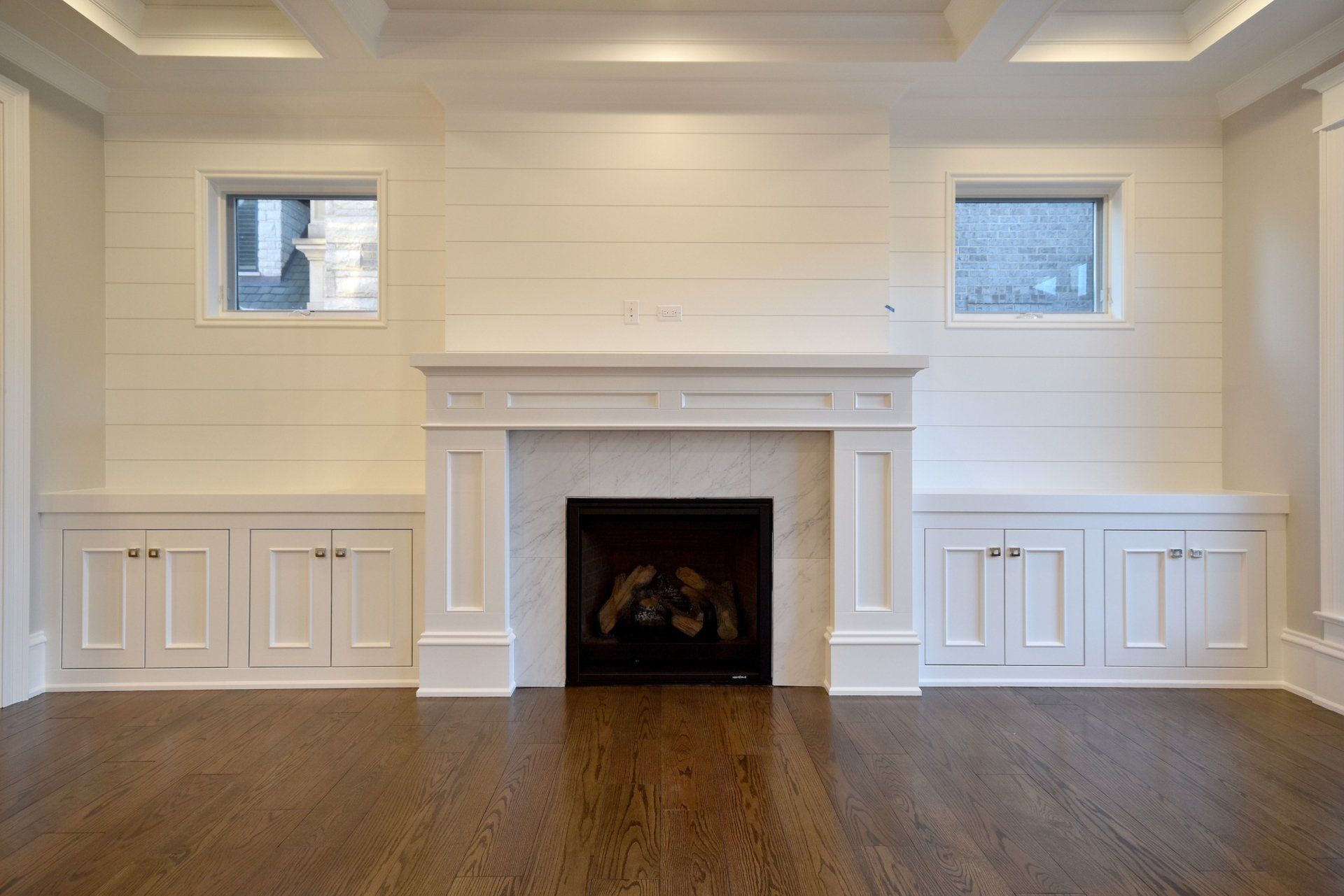 There is a fireplace in the middle of the room.