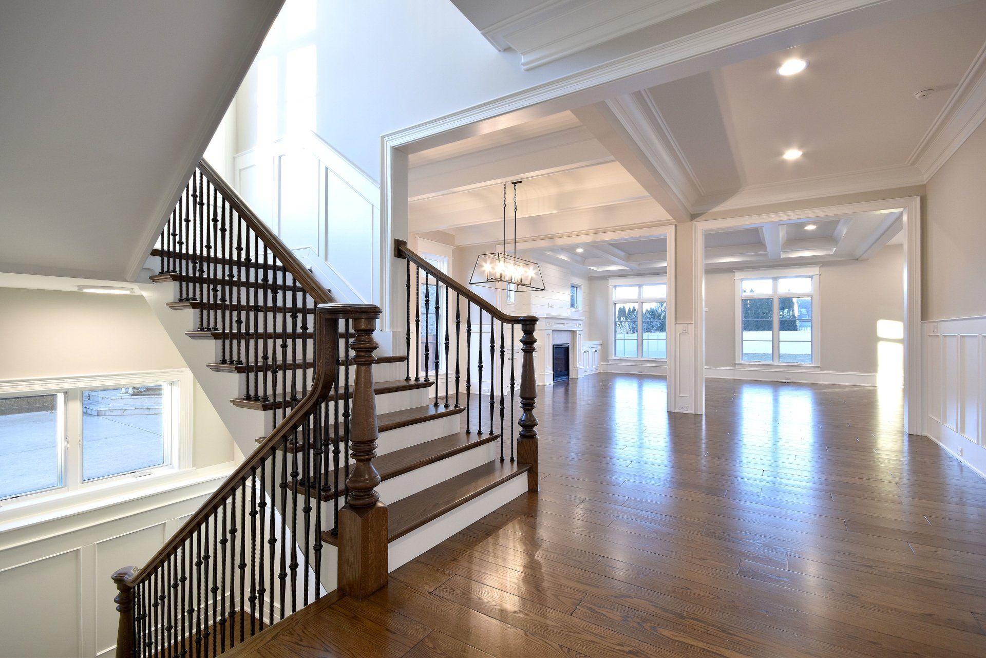 An empty house with a staircase leading up to the second floor
