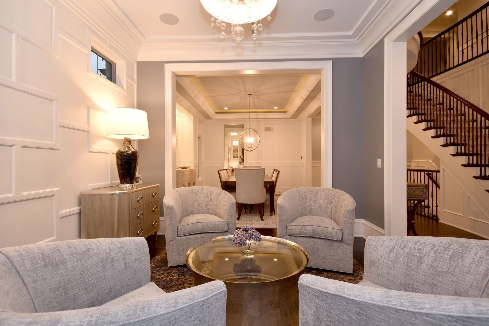 A living room with two chairs and a coffee table