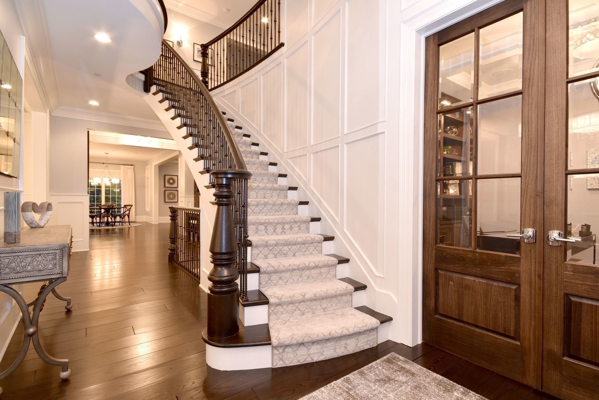 There is a large staircase in the middle of the room.