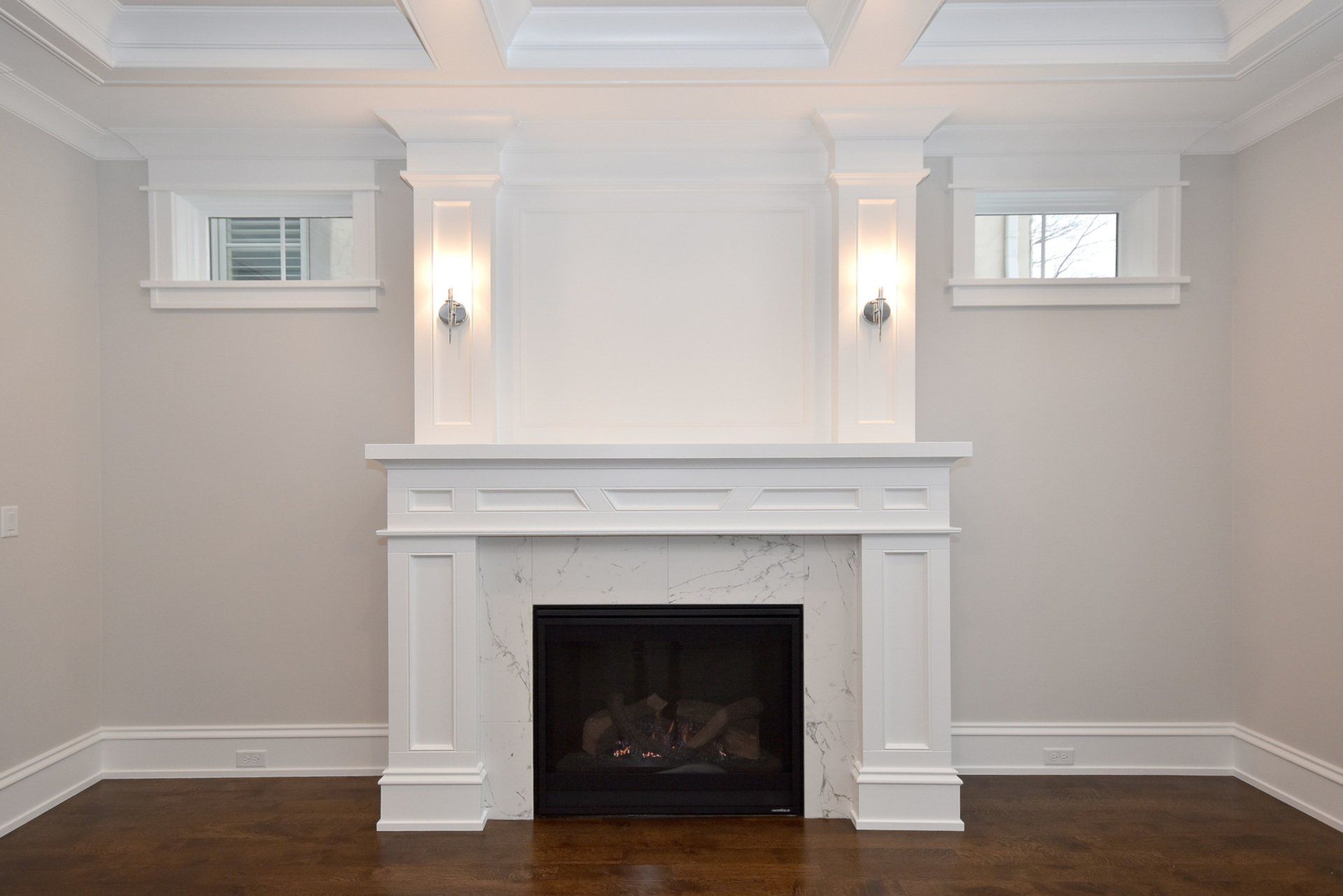 There is a fireplace in the middle of the room.