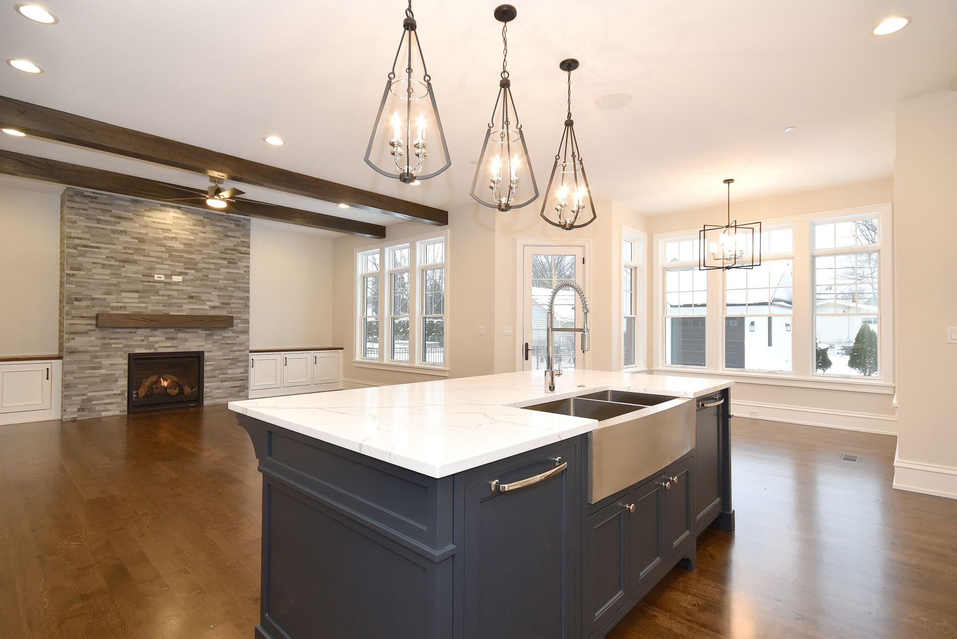 There is a large island in the middle of the kitchen.