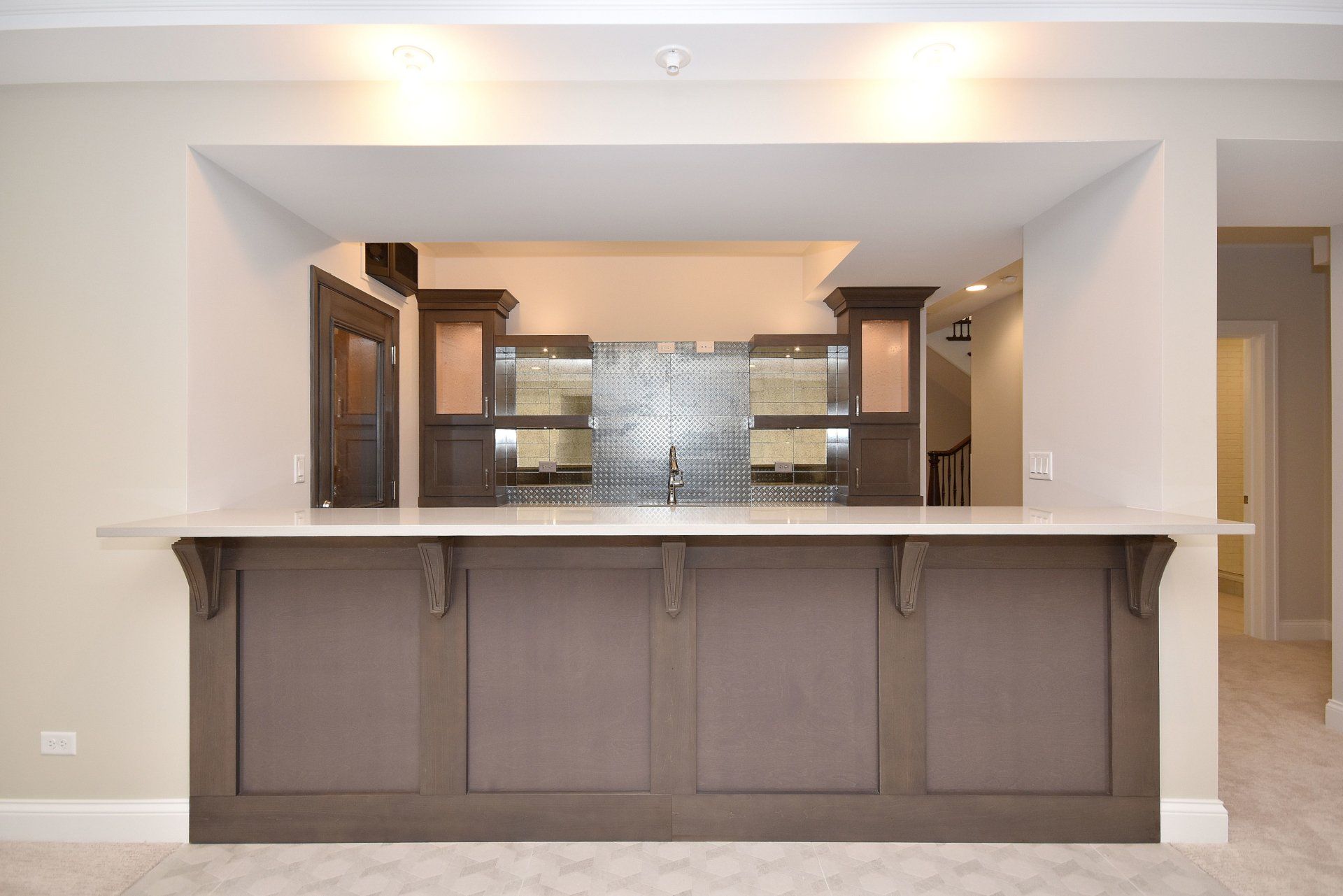 There is a bar in the middle of the room.