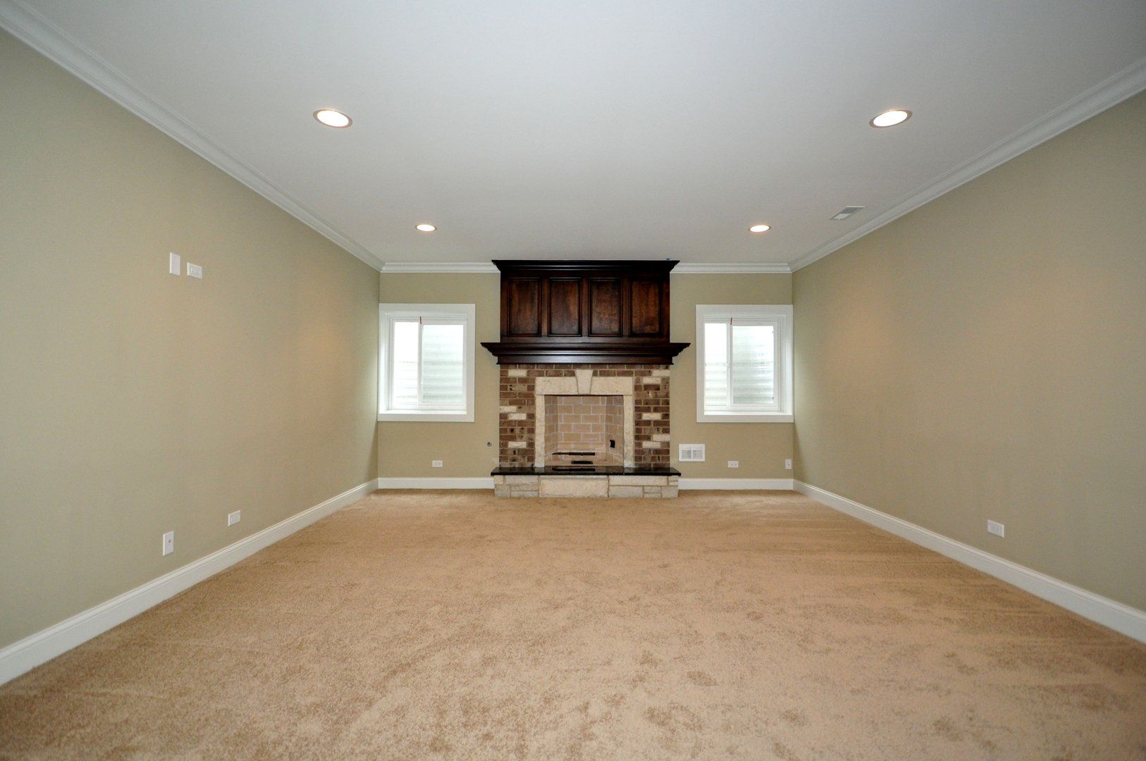 There is a fireplace in the middle of the room.