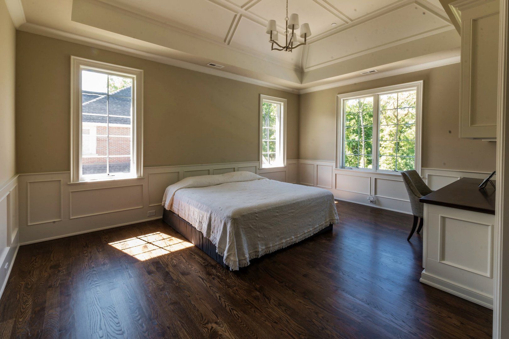 There is a large bed in the middle of the room.