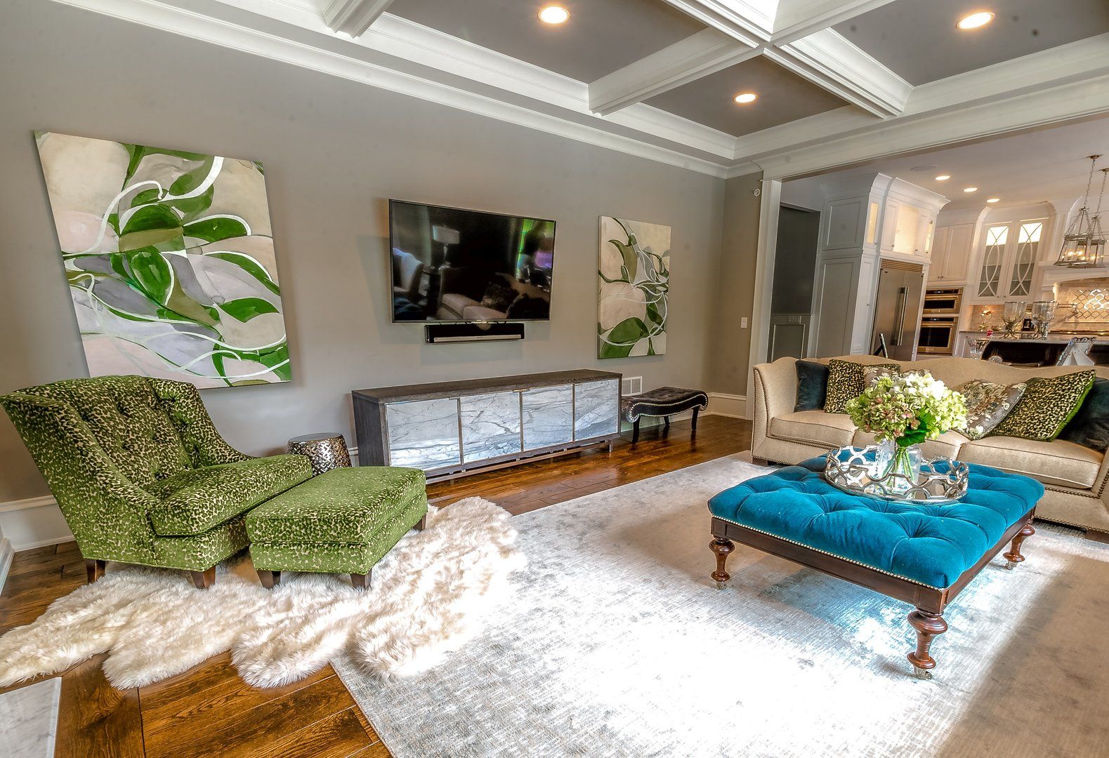 A living room filled with furniture and a flat screen tv.