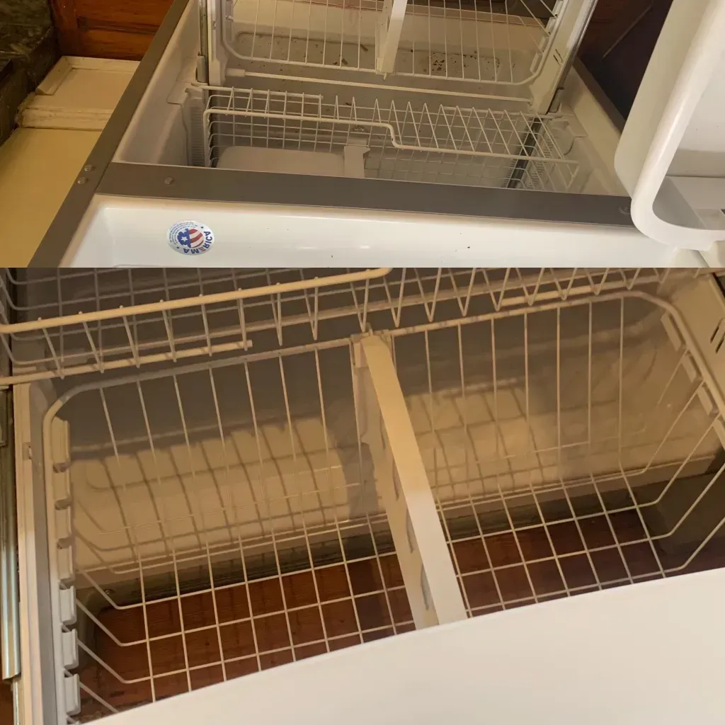 The inside of a dishwasher with a sticker that says ' stainless steel ' on it