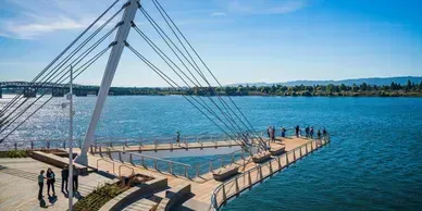 An aerial view of a bridge over a body of water.