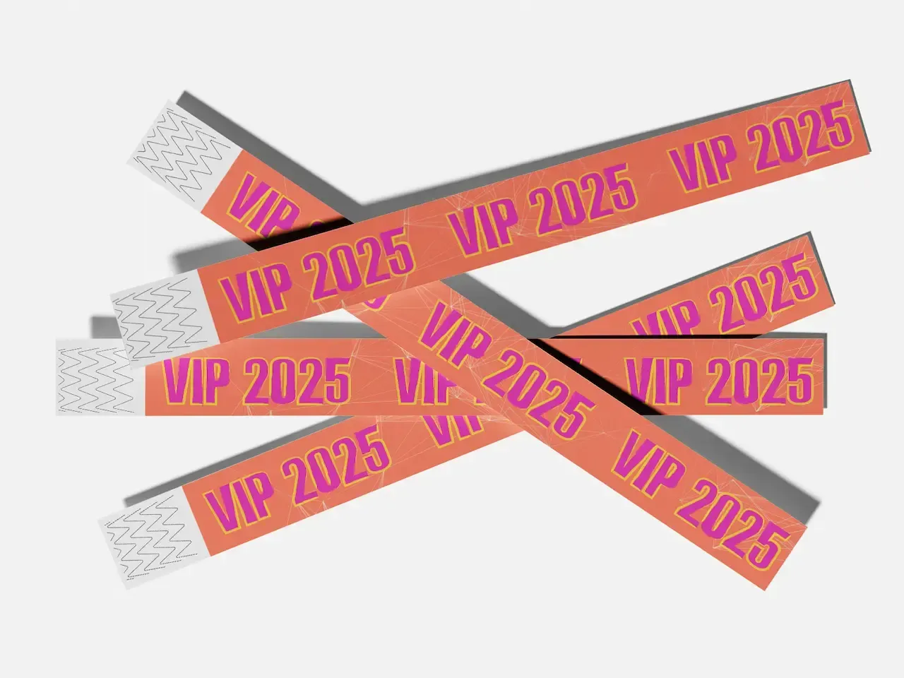 Orange VIP 2025 wristbands with pink text, several overlapping on a white background.