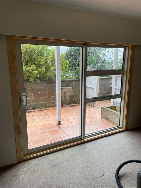 Sliding Glass Door Leading to Patio — Lower Hutt, NZ — Complete Aluminium Maintenance Ltd
