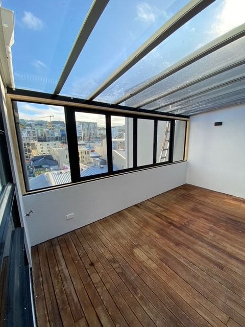 Room with a Lot of Windows and a Wooden Floor — Lower Hutt, NZ — Complete Aluminium Maintenance Ltd