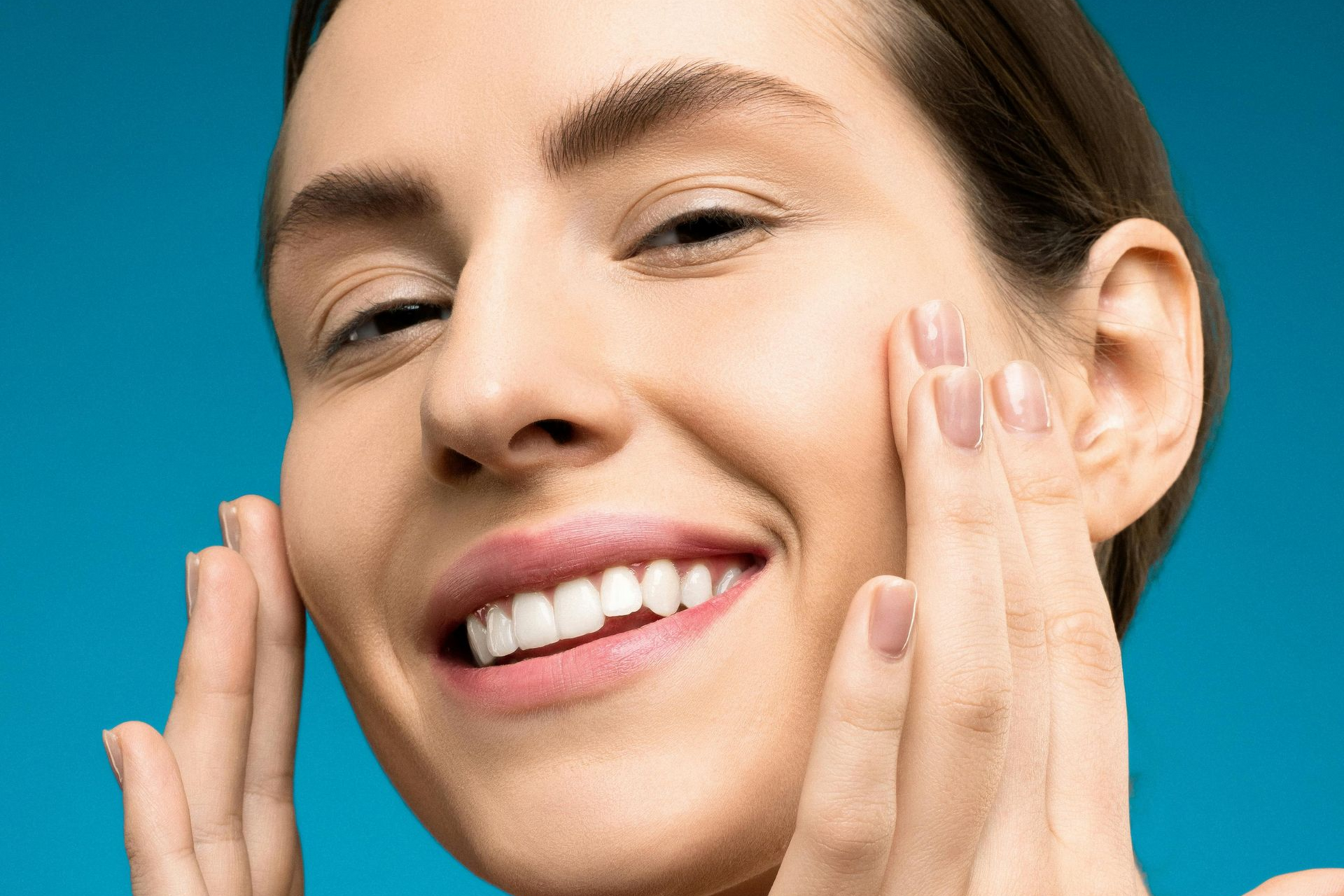 Woman show her brush with damaged long loss hair