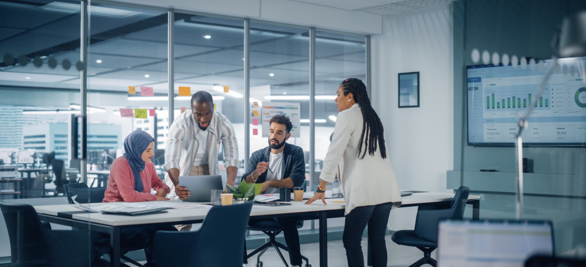 A group of people are having a meeting in an office.