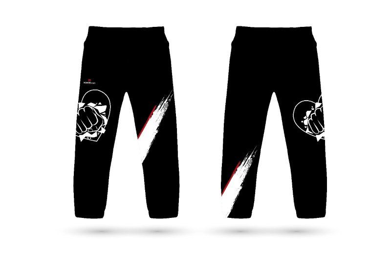 Un par de pantalones deportivos negros con un puño en el costado.