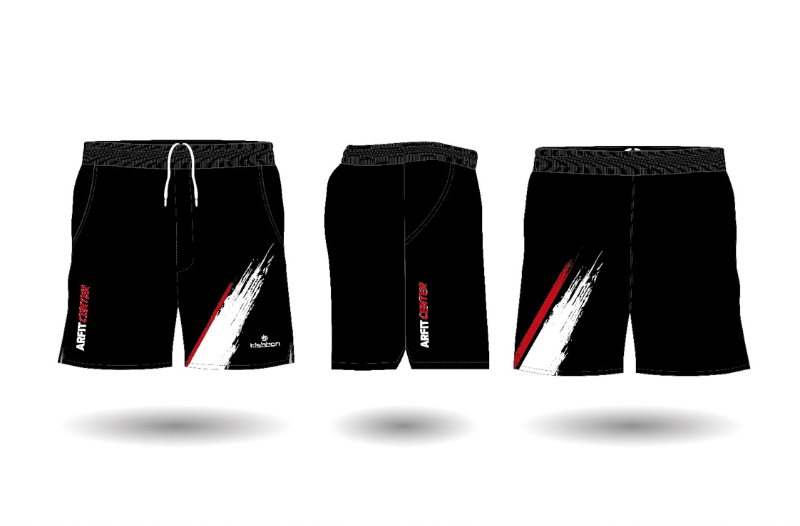 Un par de pantalones cortos negros con una raya roja y blanca en el costado.