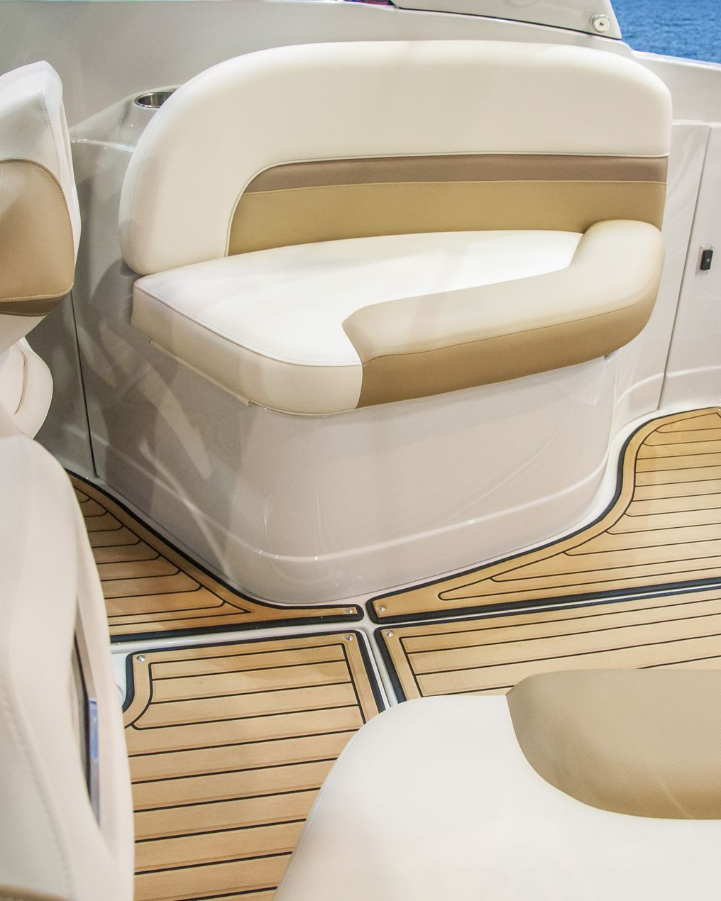 A yellow sports car is parked in a garage.