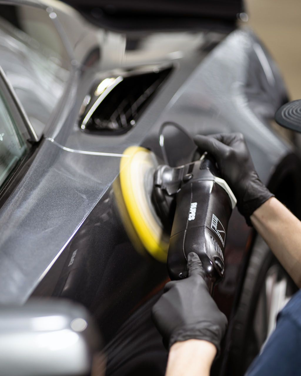 A close up of a car wheel with a mercedes logo on it
