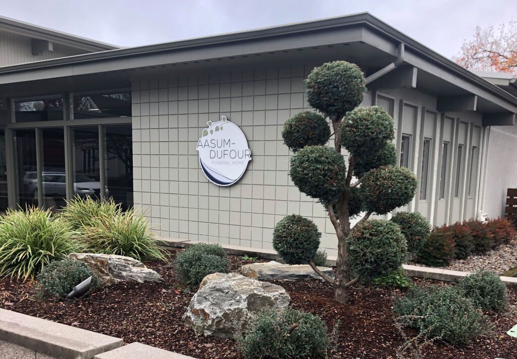 Exterior of a building with a sign that reads