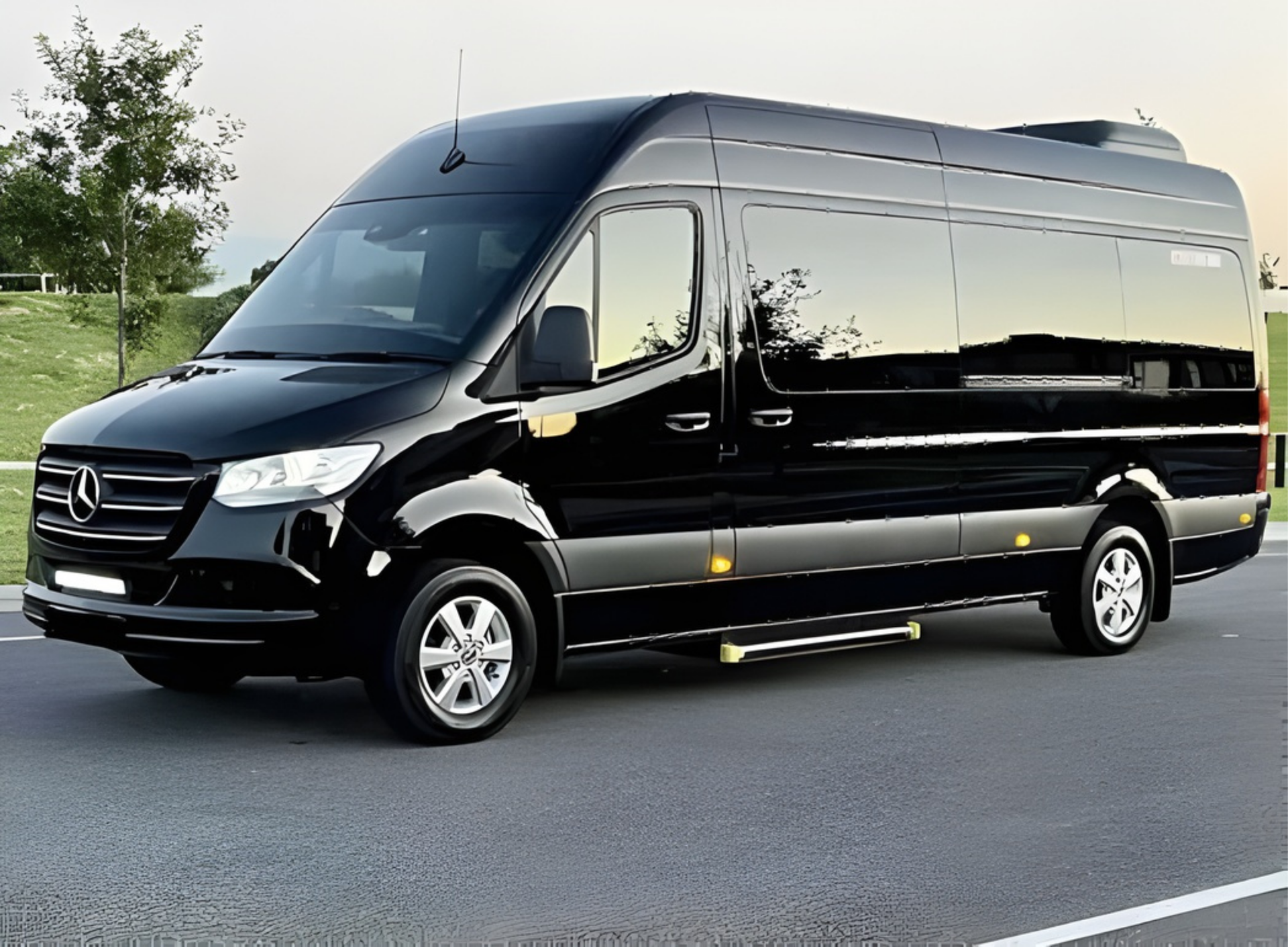 Black Mercedes-Benz Sprinter van parked on asphalt. Side view, sunny day.