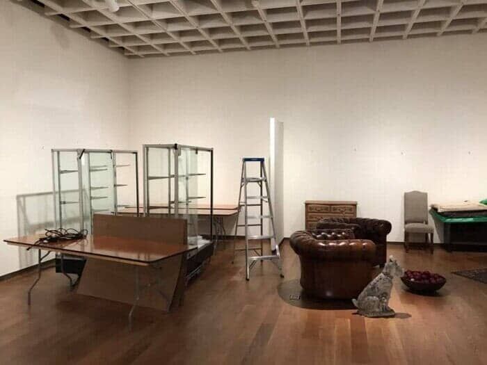 A room filled with furniture and a ladder. 28.4845° N, 81.2519° W