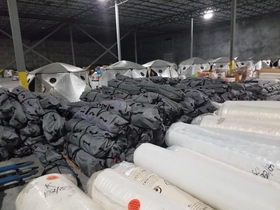 A warehouse filled with lots of plastic cups and bags. 28.4845° N, 81.2519° W